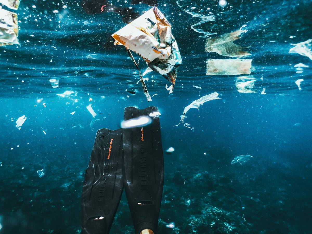 Swimming amongst plastic waste in Indonesia.